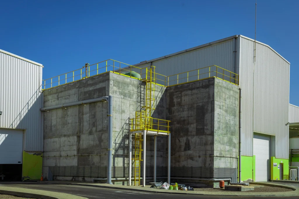 Industrial warehouse wall cleaning and heavy-duty concrete degreasing in Hollywood, Florida.