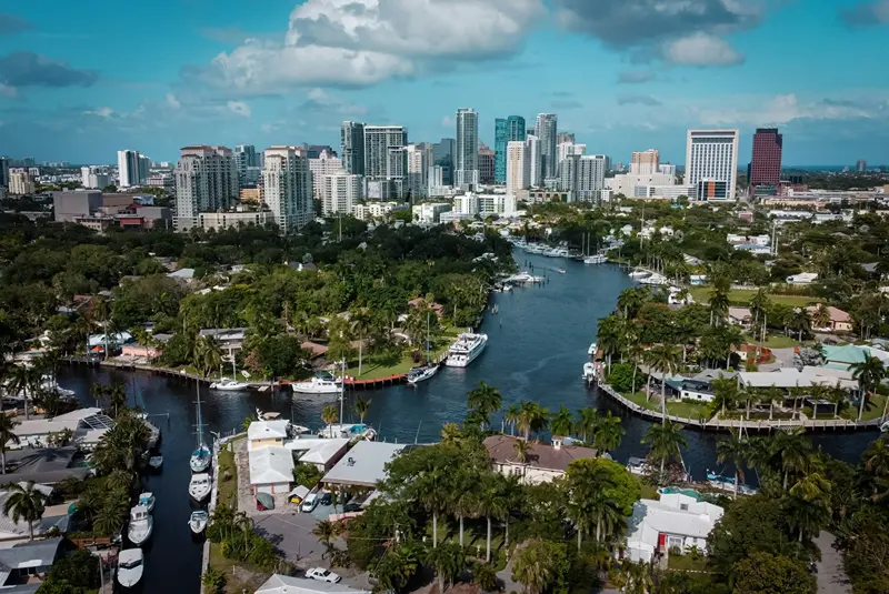 Aerial drone view of waterfront properties and residential neighborhoods in Broward County Florida.